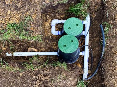 Irrigation manifold with covers